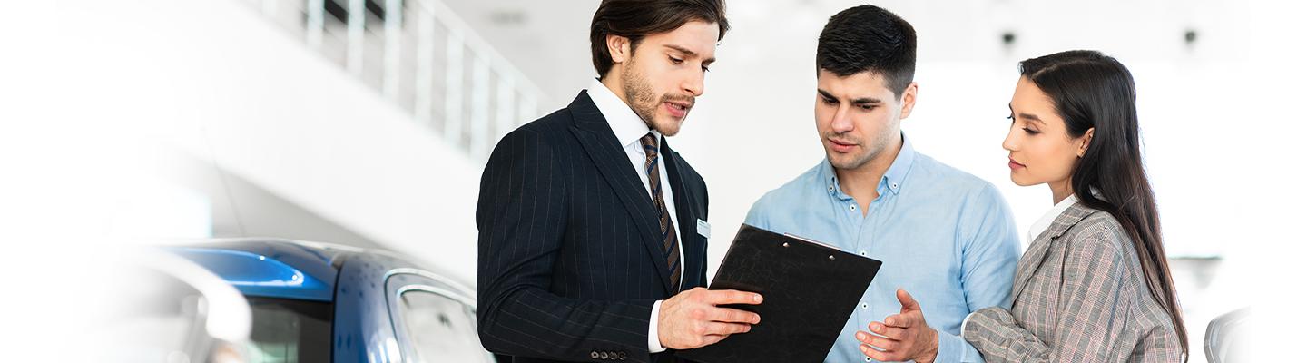 Sales person helping customers
