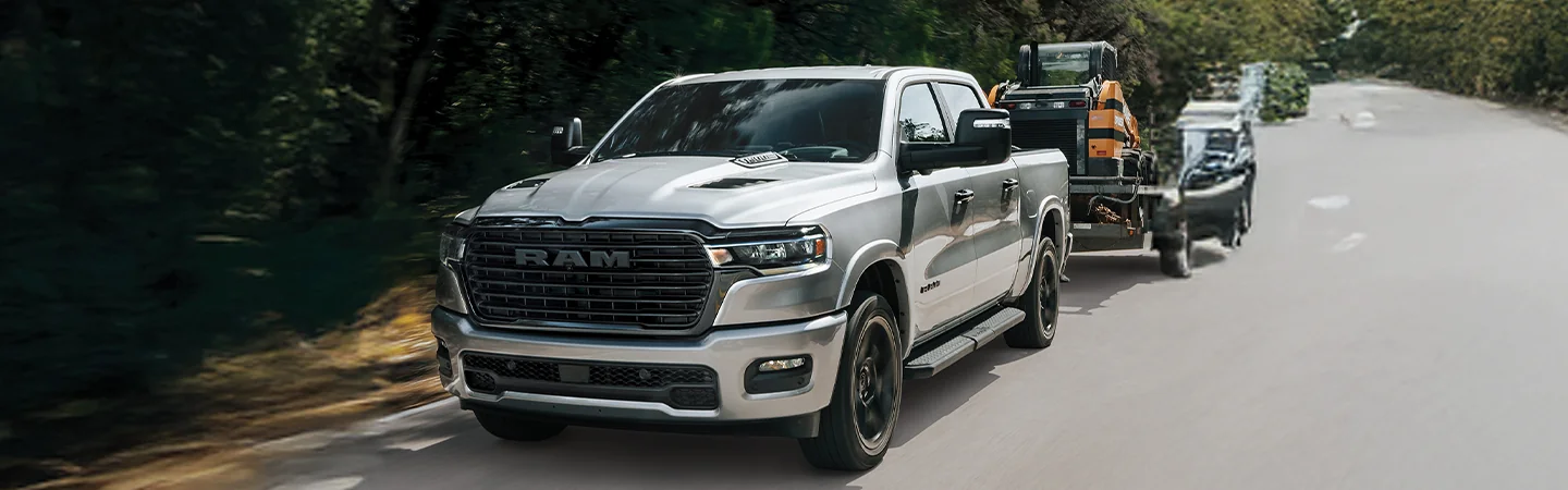 white 2025 RAM 1500 on highway
