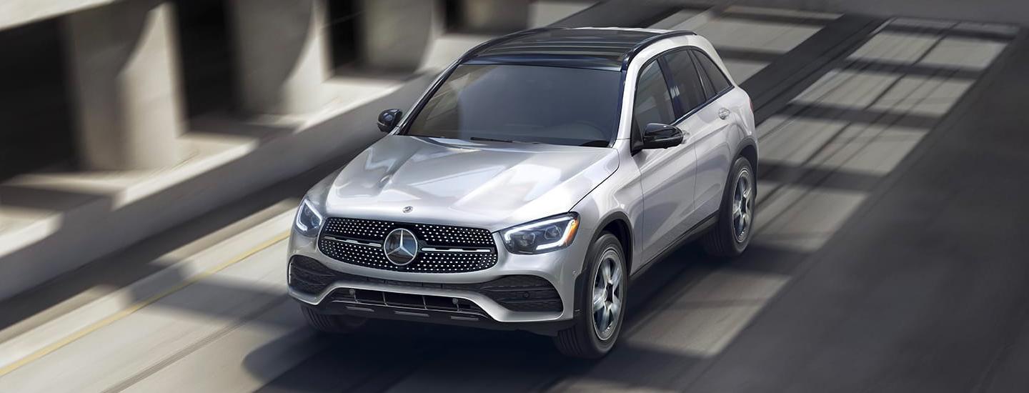 Silver Mercedes Benz GLC in motion