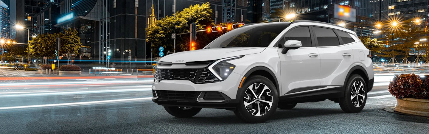 white Kia Sportage parked