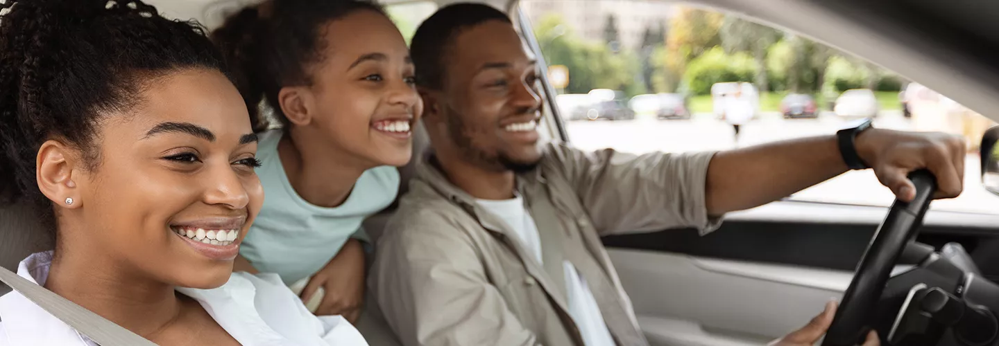 Family driving in a new Lamborghini