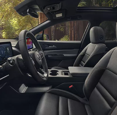 Honda Prologue interior with black leather seats dashboard and center console view