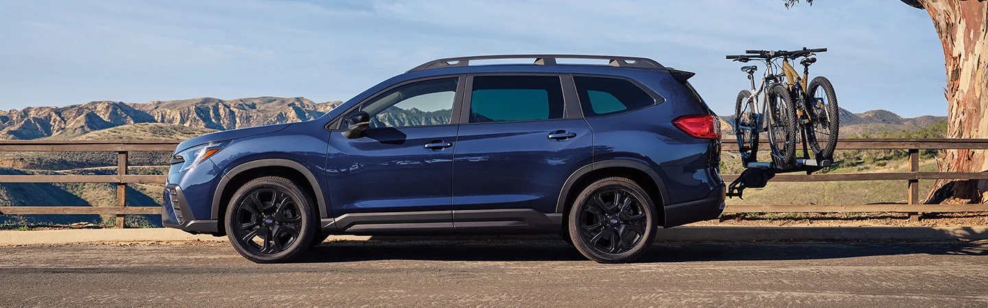 2025 Subaru Ascent vs Toyota Highlander Blue color side view