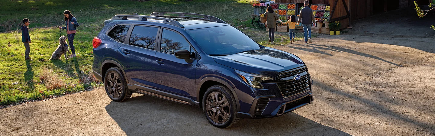 2025 Subaru Ascent vs Toyota Highlander Blue color side view