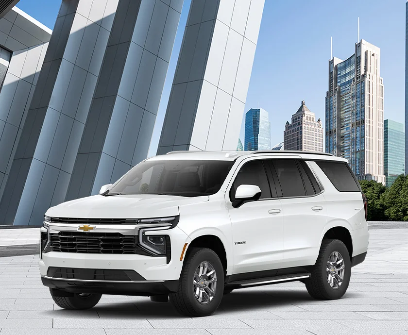 a white 2026 Chevrolet Tahoe parked in city