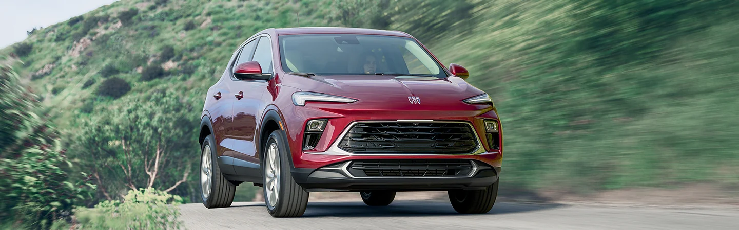 2025 Buick Encore GX red color car driving on road
