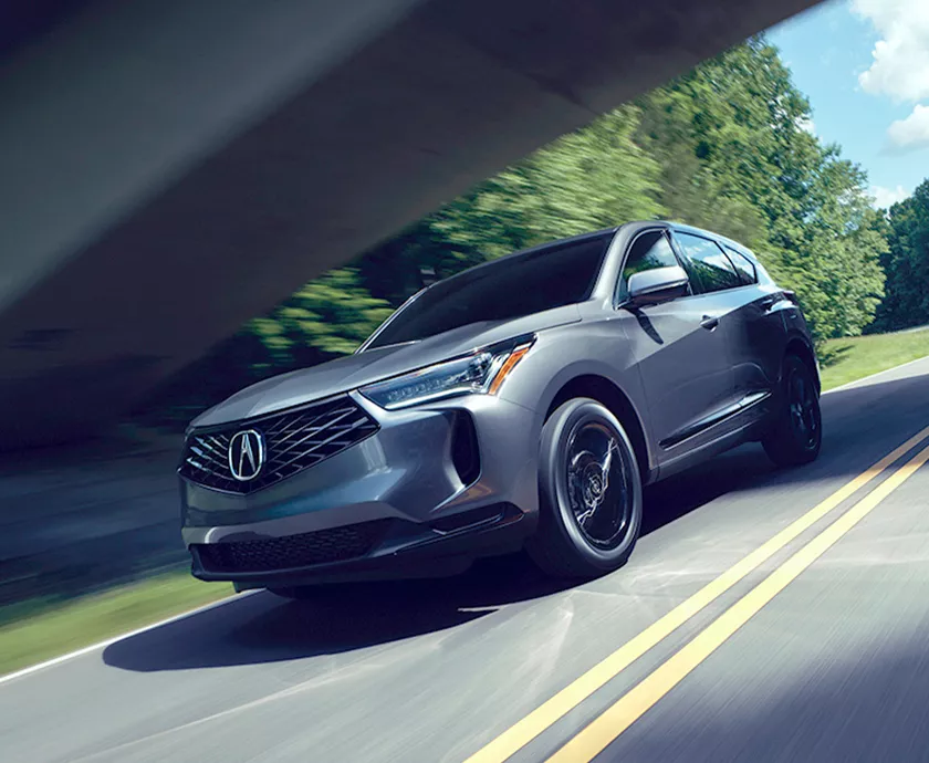 2026 Acura RDX driving on a road