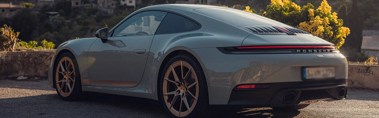 rear view of a gray 2025 Porsche 911 Carrera