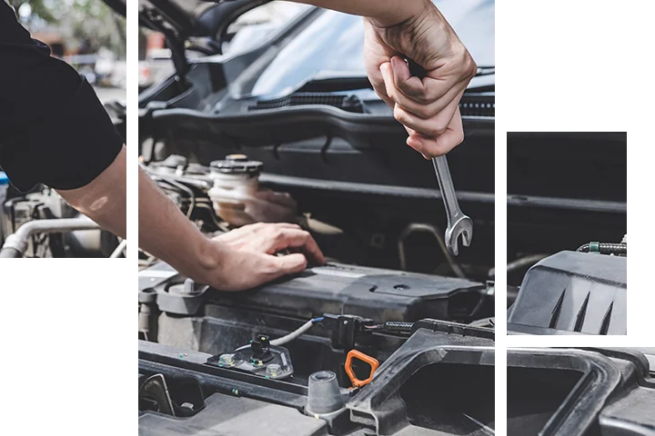 auto mechaninc with wrench working on car