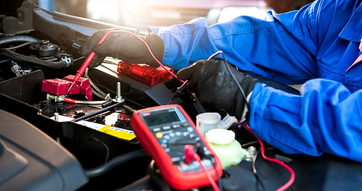 mechanic working with meter