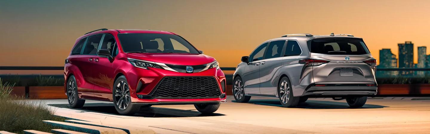 Two 2022 Toyota Sienna parked with city in the background