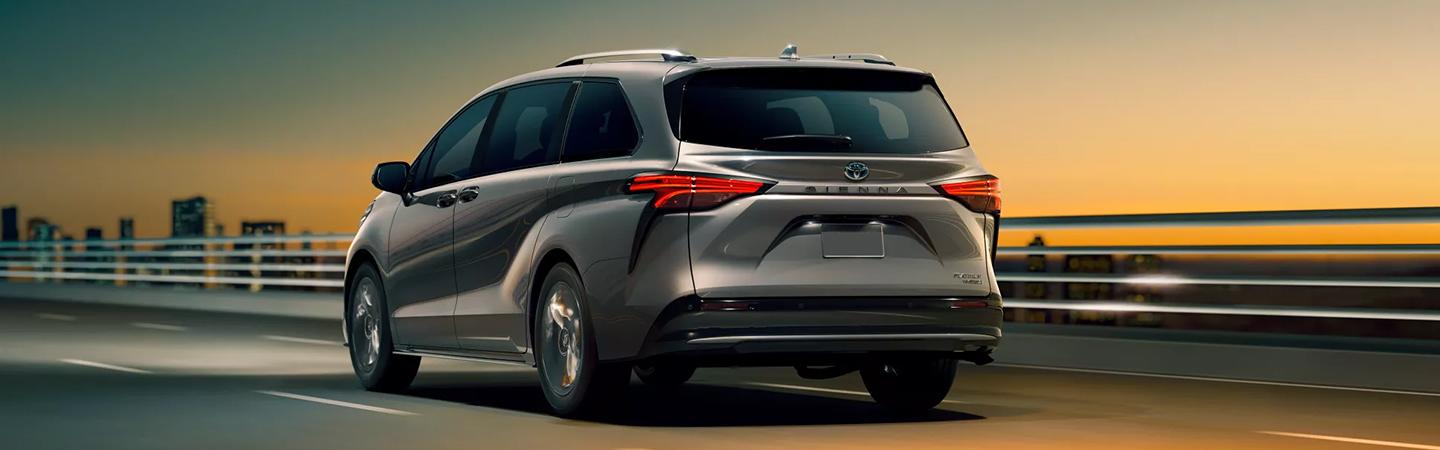 A 2022 Toyota Sienna driving to the city