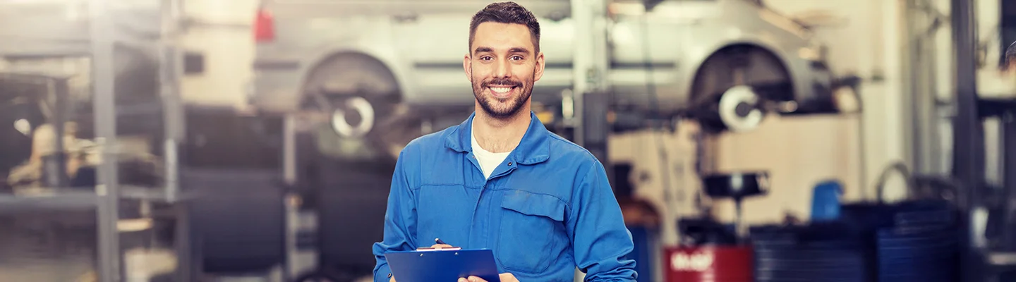 smiling Honda service agent