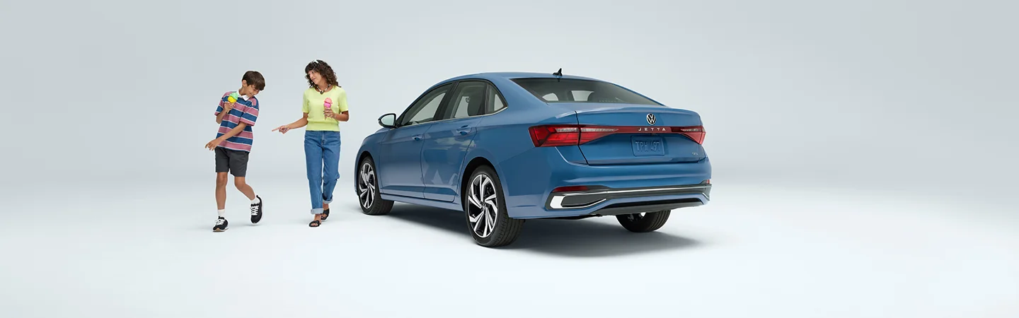 2025 Volkswagen Jetta vs Jetta GLI Blue color back view 