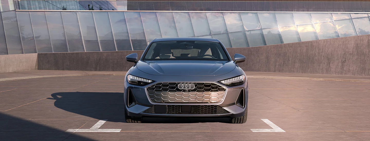 Front view of a parked gray 2025 Audi A5