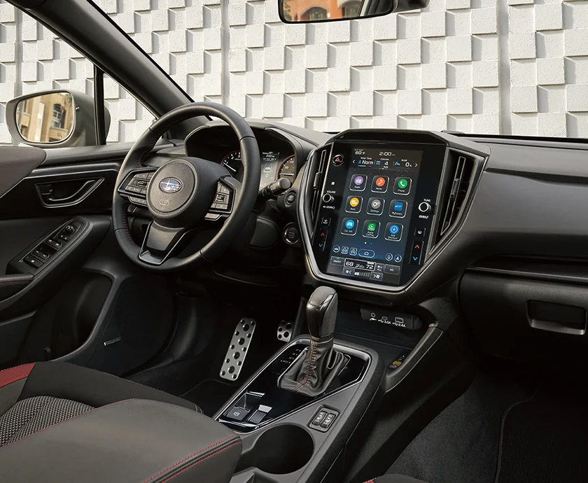 Interior view of the bashboard and tech in a 2026 Subaru Impreza