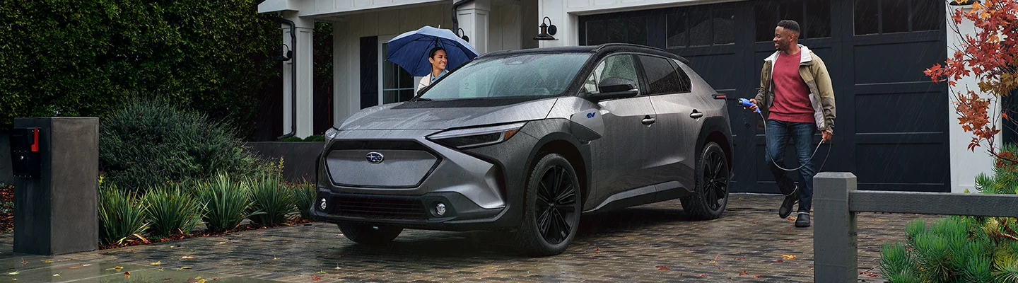 2025 Subaru Soltera SUV parked in front of a house