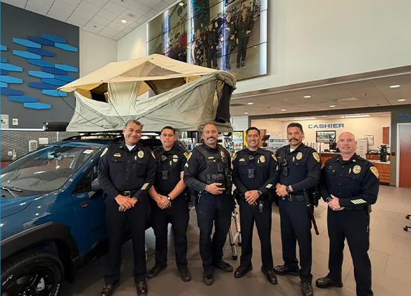 Fire fighters standing in Dalton Subaru