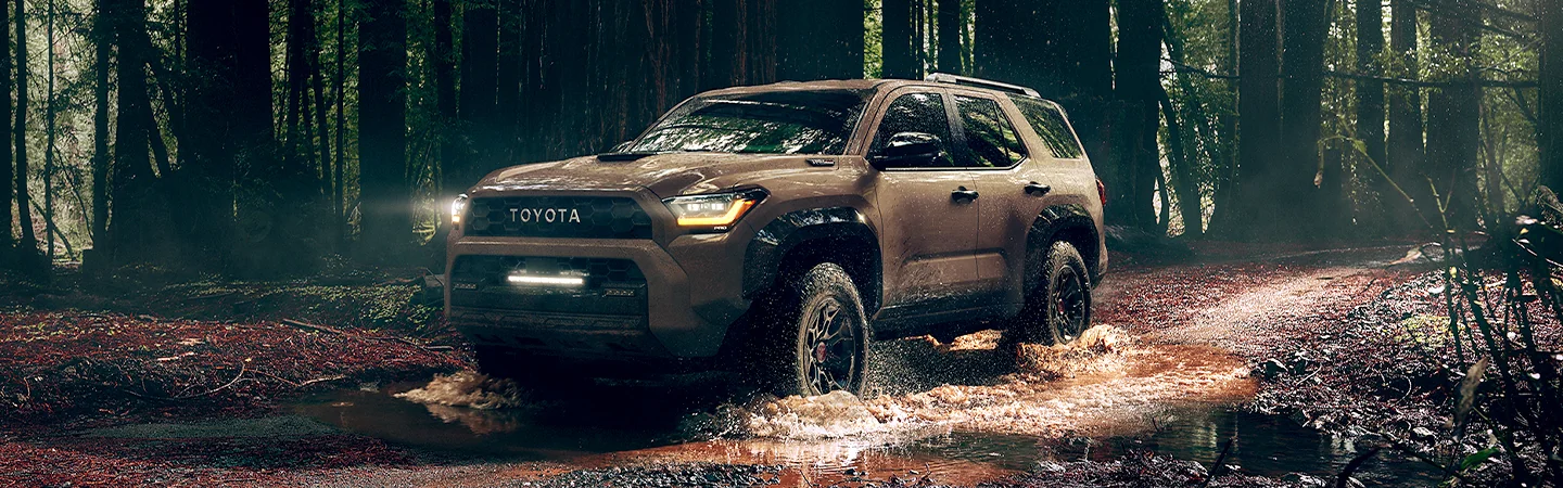 2025 Jeep Grand Cherokee vs Toyota 4Runner Brown color Front View