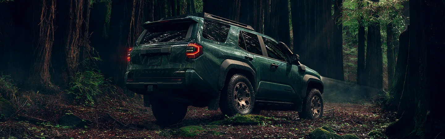 2025 Jeep Grand Cherokee vs Toyota 4Runner Green color back view