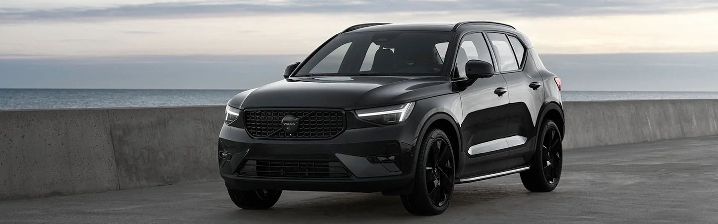 Front view of a parked 2025 Volvo XC40 by water