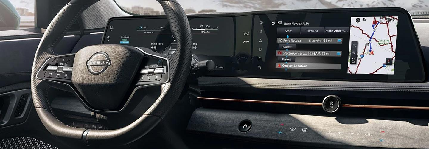 View of the driver seat and tech in a 2022 Nissan Ariya