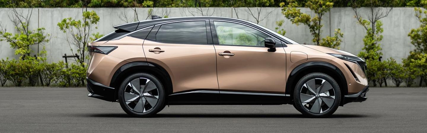 Side view of a 2022 Nissan Ariya parked