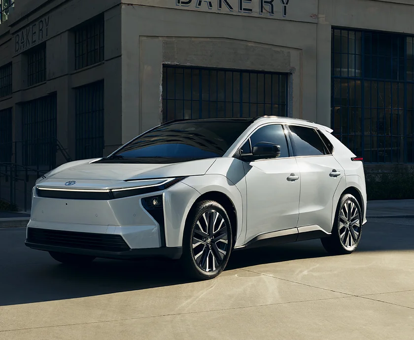 an exterior view of a white Toyota bZ