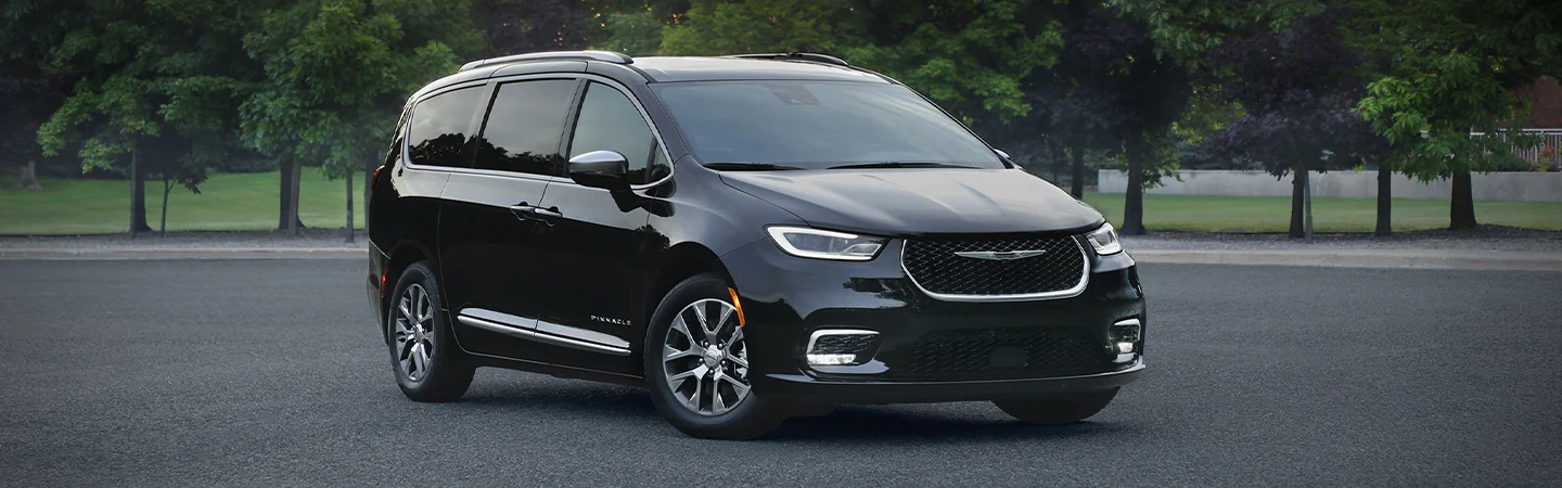 2025 Chrysler Pacifica Specs black color stand on road