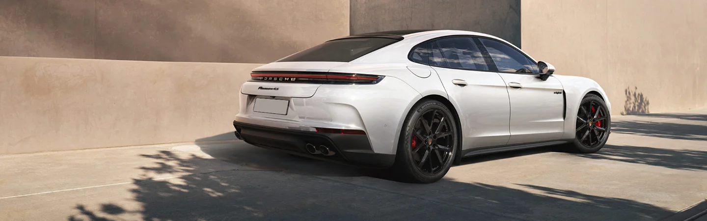 rear view of a parked white 2026 Porsche Panamera 4 E-Hybrid