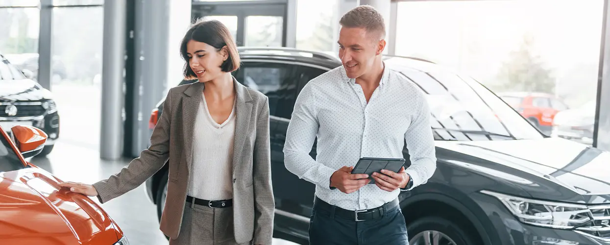 people car shopping in showroom