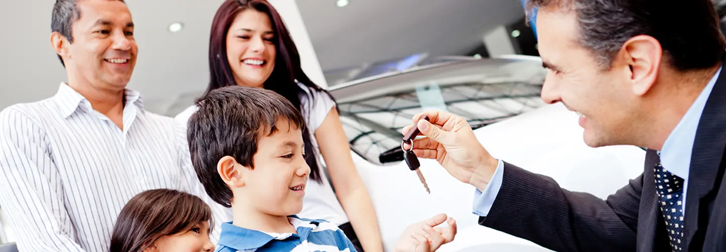 people shopping for a new car at our dealership showroom