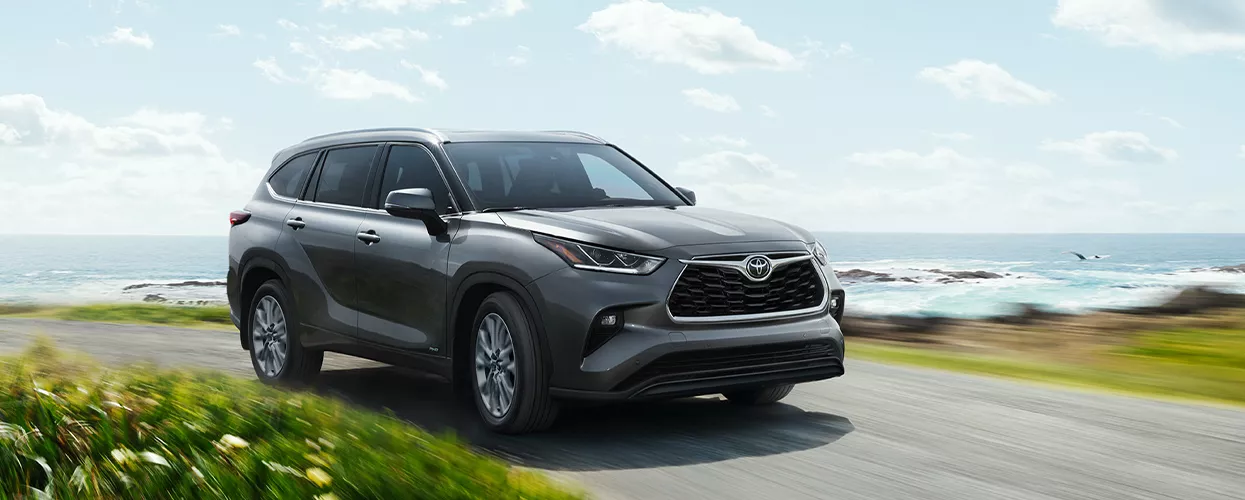 Toyota Highlander driving near the coast