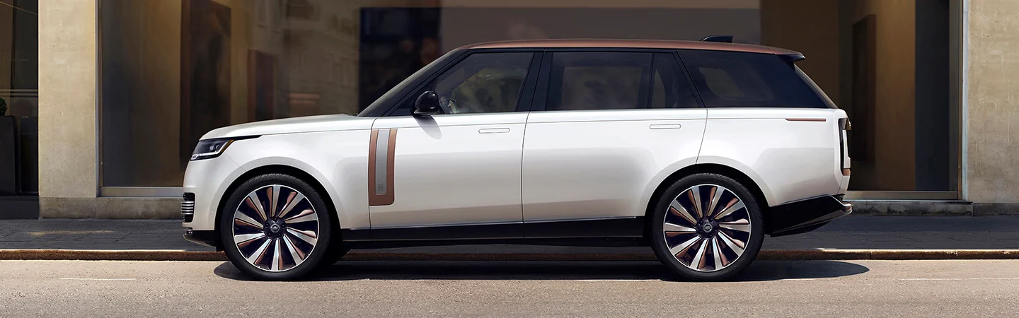 white 2025 Range Rover parked on road
