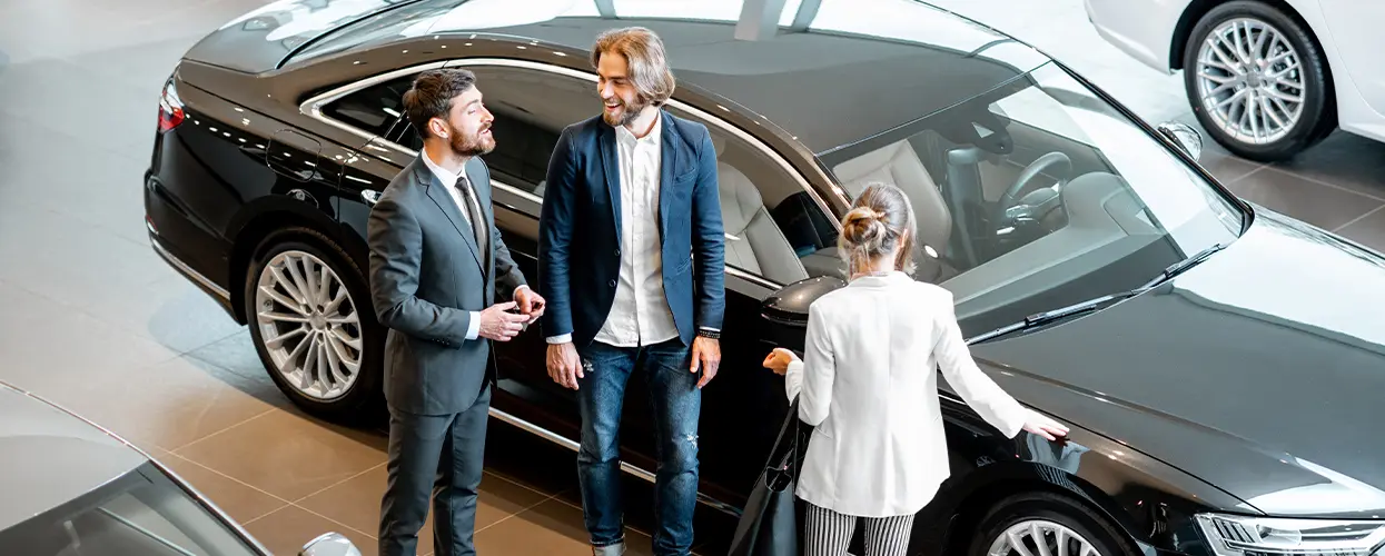 people car shopping in showroom