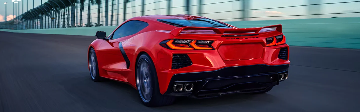 Back view of a2024 Chevrolet Corvette Stingray on a racetrack