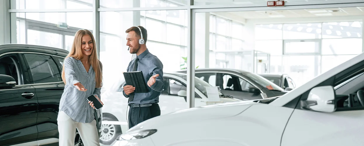 A customer experiencing Premium Customer service with another person in showroom