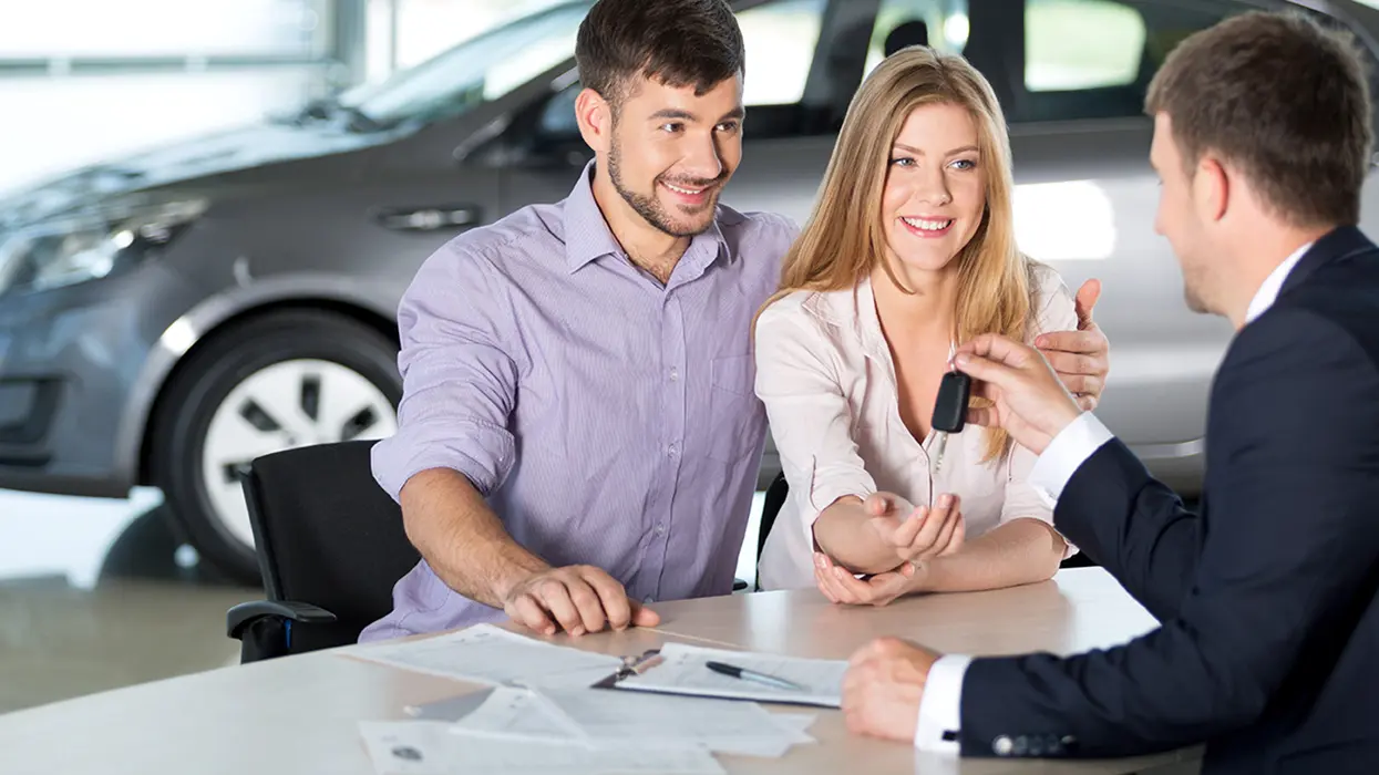 couple talking to salesman