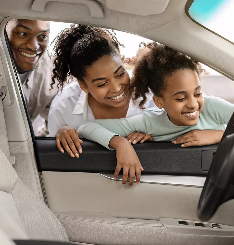Family looking into a new Ford Ranger