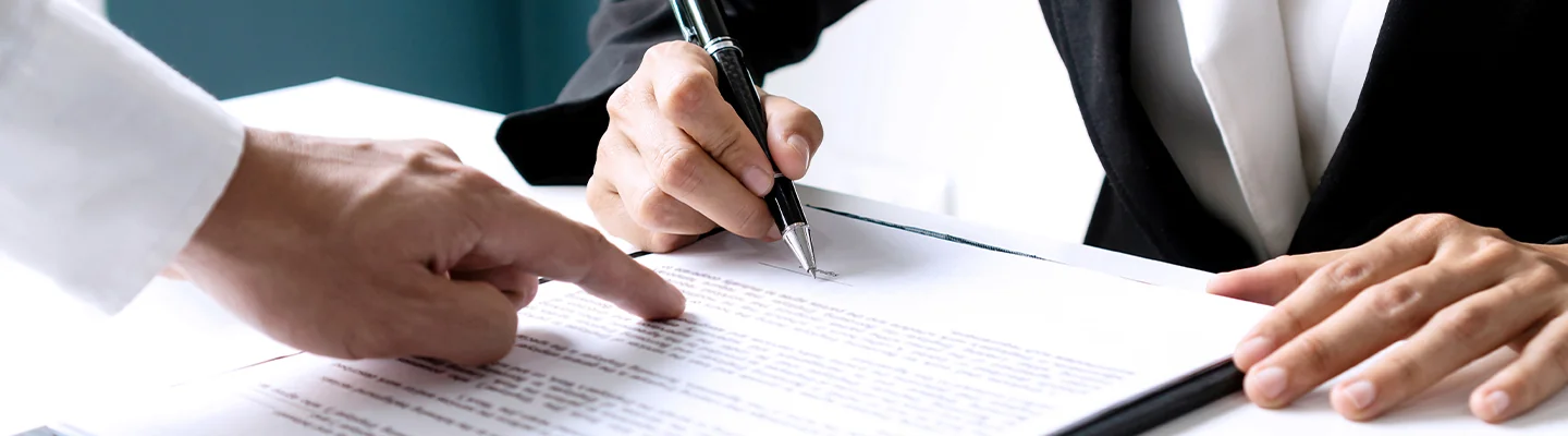 Customer signing paper work
