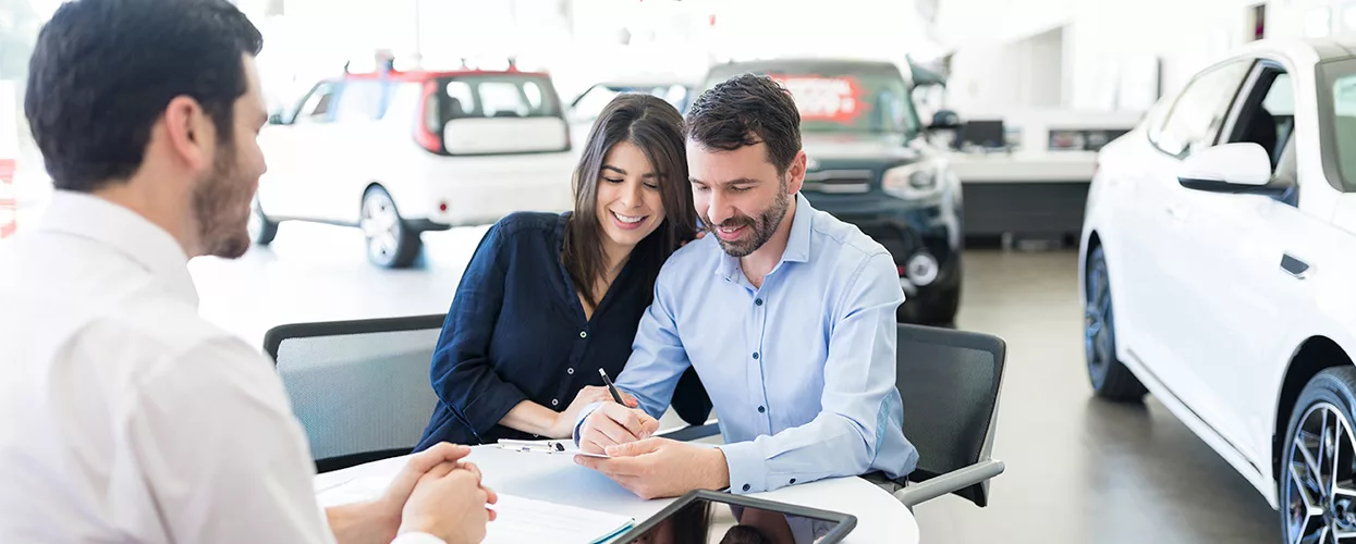 couple at a dealership