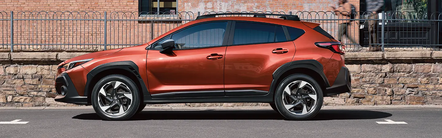 2024 Subaru Crosstrek vs Toyota RAV4 back side green