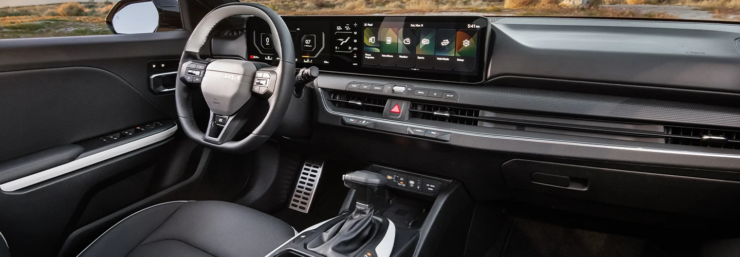 Interior view the dashboard and tech of a 2025 Kia K4