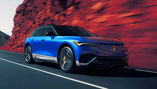new blue Acura on the road