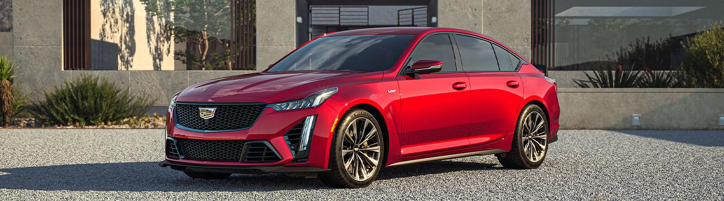 Angled profile of a parked red Cadillac CT5-V Blackwing