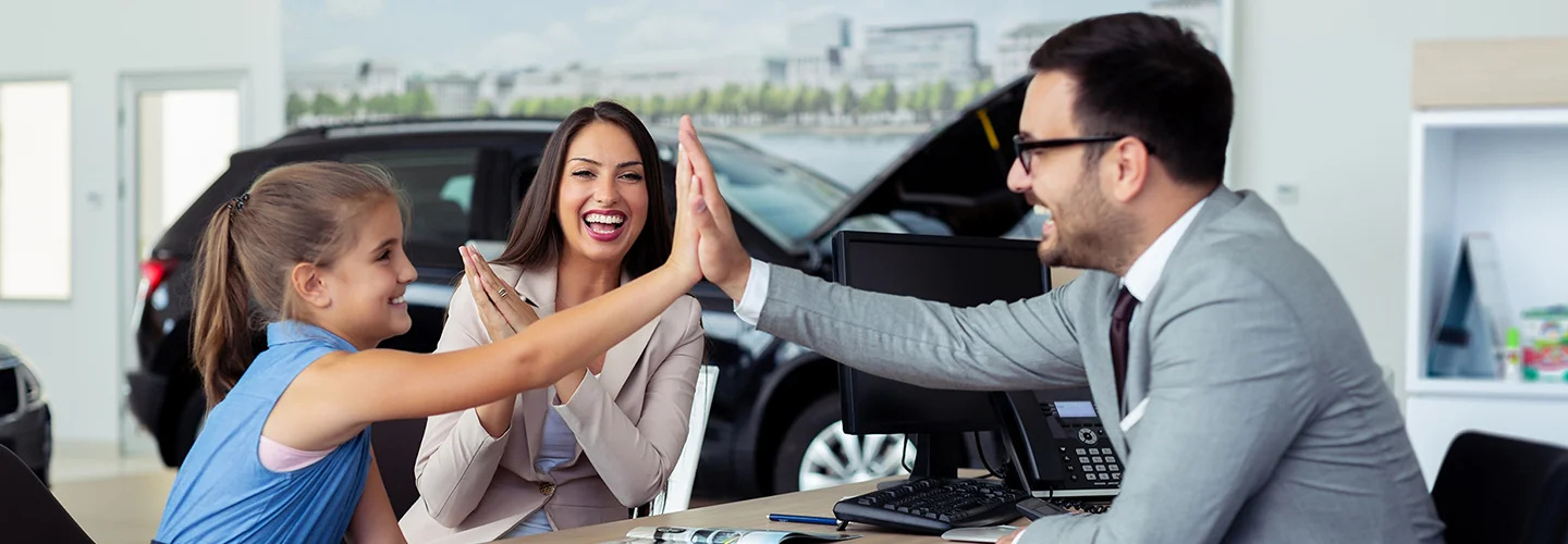Teenage girl giving the finance advisor a high-five