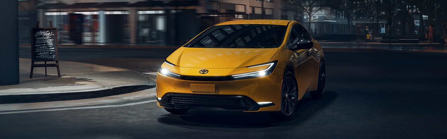 front yellow Toyota Prius