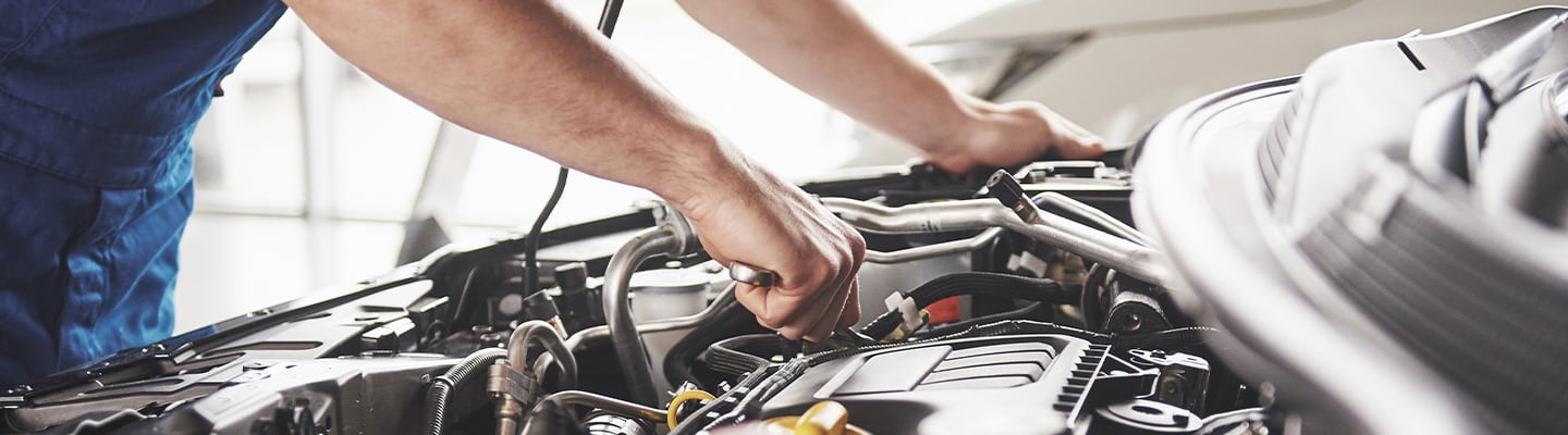Technician checking car