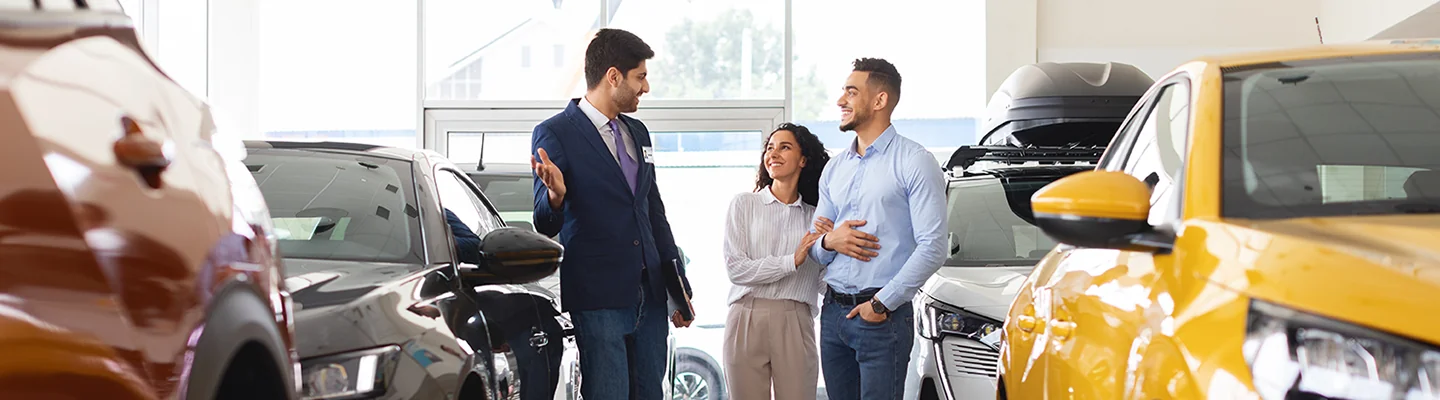 Sales person helping customers