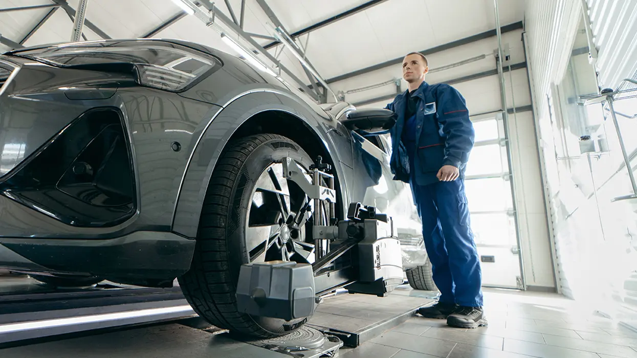 tech near car in service